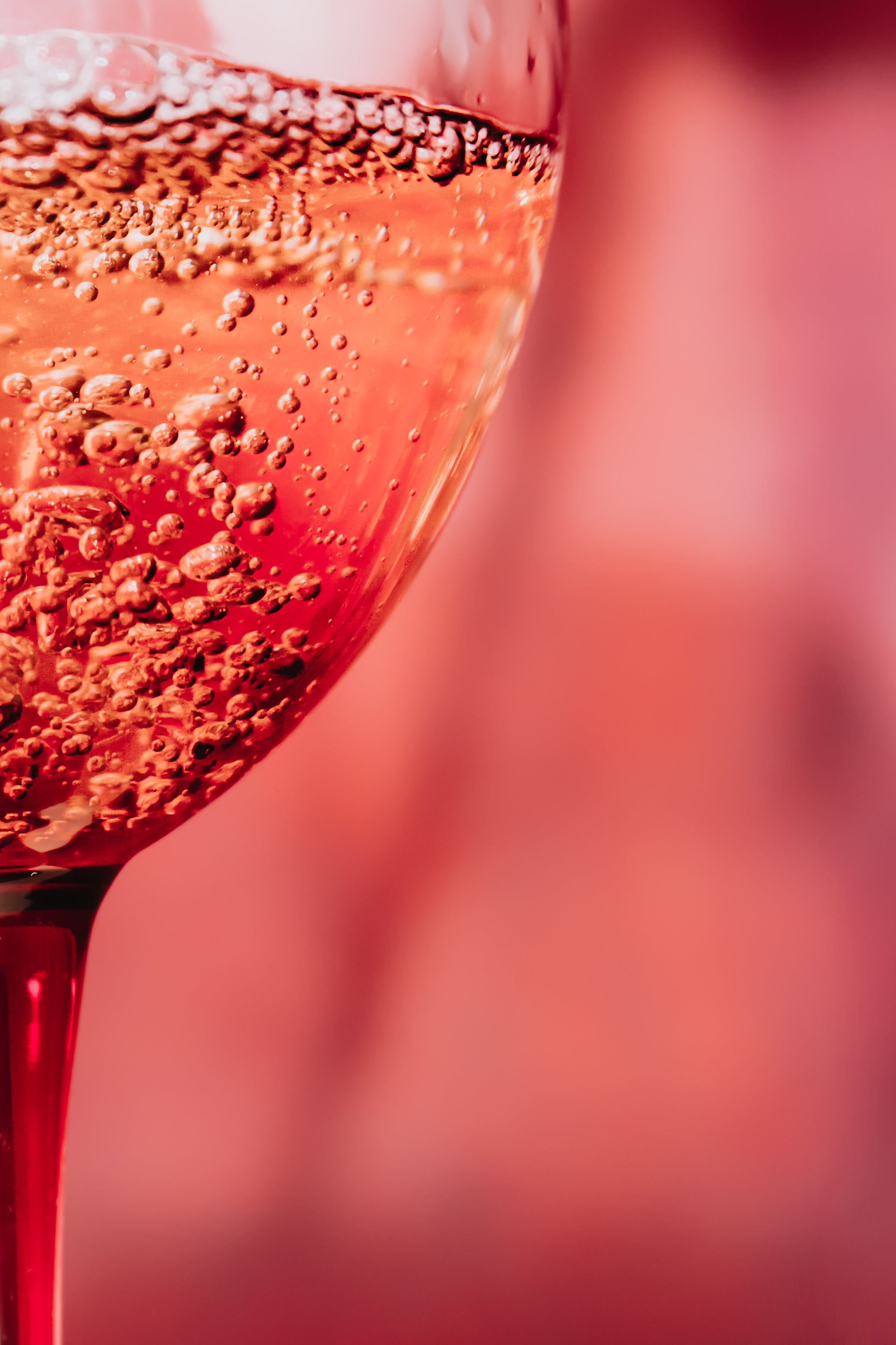 close-up-of-bubbles-in-a-pink-glass - REGEN