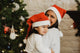 toddler-and-mom-in-santa-hats - REGEN